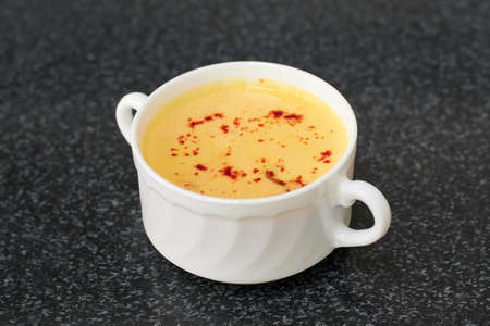 A bowl of delicious homemade creamy soup.の写真素材