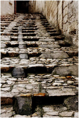 ancient cobbled street in Matera, Italyの写真素材