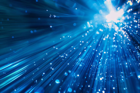 A blue sky with a lot of light shining through it. The light is scattered and creates a beautiful, dreamy effectの素材