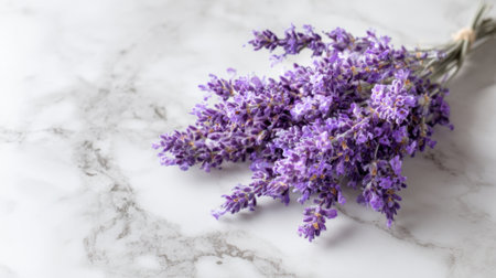 Freshly cut lavender adds a soothing touch to the elegant marble background creating tranquility.の素材