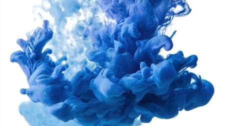 Blue ink pieces dance in water forming stunning shapes and waves creating an enchanting visual experience.の素材