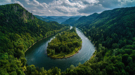 A beautiful landscape showcases a river flowing through dense forests and mountains. The sunlight reflects on the water, highlighting the rich greenery and undulating terrain.の素材