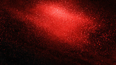A burst of bright red particles swirls against a dark background creating a mystical atmosphere.の素材