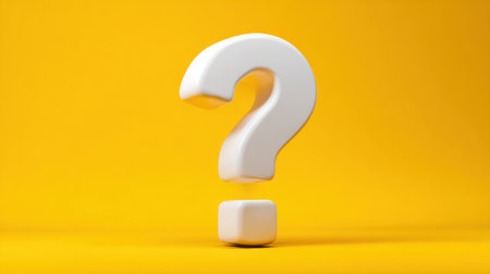 A large smooth white question mark hovers above a smaller white block on a vibrant yellow background. This striking contrast draws attention and invites exploration of topics unknown.の素材