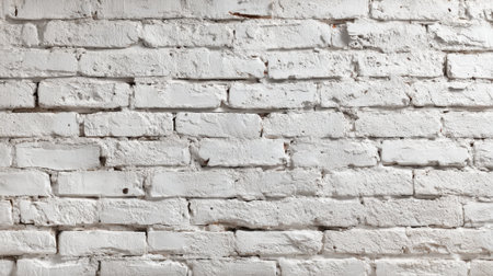 This white brick wall features a textured surface with distinct mortar lines and slight imperfections, showing a rustic aesthetic in an indoor environment perfect for design inspiration and decor.の素材