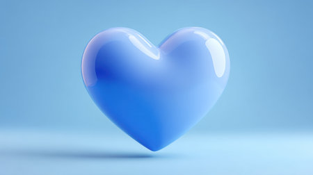 A light blue heart shape floats in the center of a soft blue background. The design is smooth and simple creating a soft visual effect suitable for various uses.の素材