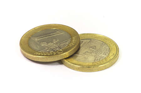 Two one euro coins over white background