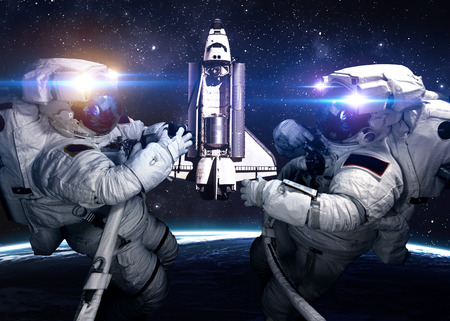 Astronaut in outer space against the backdrop of the planet. の写真素材