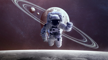 Astronaut in outer space against the backdrop of the planet. の写真素材