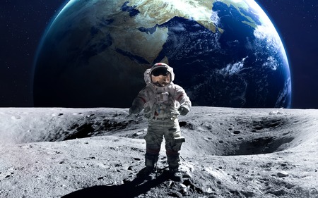 Brave astronaut at the spacewalk on the moon. の写真素材