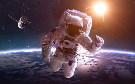 Astronaut in space over the planet Earth.