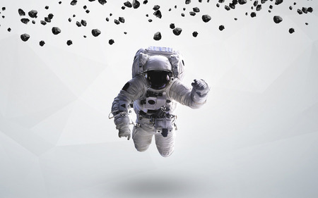 Astronaut in outer space modern art.の写真素材