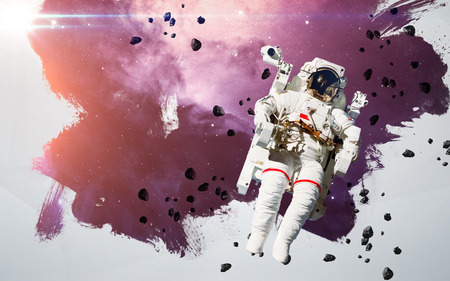 Astronaut in outer space modern art.の写真素材