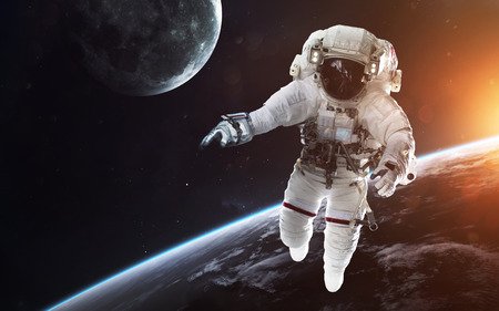 Brave astronaut at the spacewalk. People in space.の写真素材