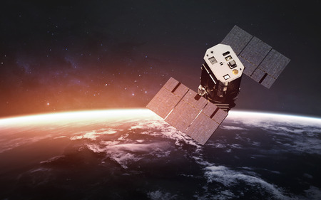 Satellite orbiting beautiful Earth planet.の写真素材