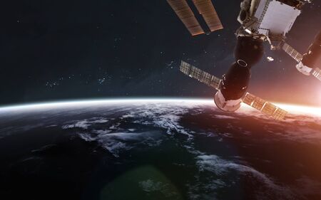 International space station orbiting Earth planet. Science fiction art.