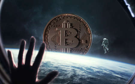 3D illustration of Bitcoin on the background of the planet Earth. Cryptocurrencies - the blockchain technology of the future.の写真素材