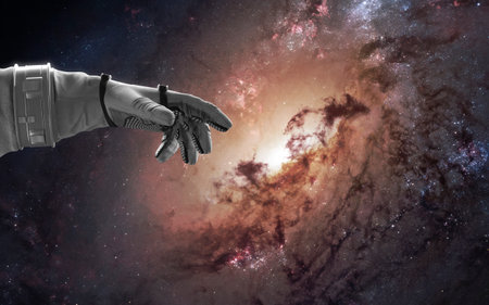 3D illustration of giant spiral galaxy, astronaut hand. Black hole. 5K sci-fi visualizationの写真素材