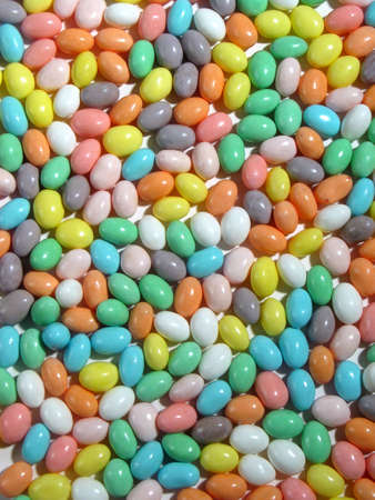 Different colored pastel Jellybeans fill an entire image from edge to edge