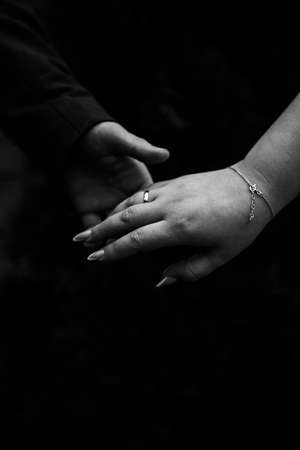 Close-up hand contact. The concept of meetings and breakups. Romance.の写真素材