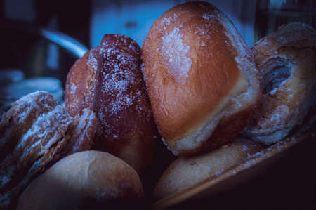 Pastries at breakfast with rolls and pachanga