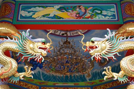 Dragons and drawing decoration of a Chinese temple.の写真素材