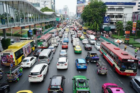 BANGKOK, THAILAND - DECEMBER 25, 2019: Jammed traffic on downtown road in front of Central World...