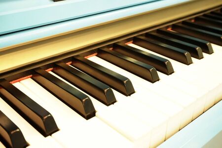 Close up shot of retro piano keys. Pastel color.の写真素材