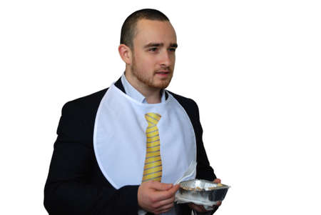 Young smiling businessman having a lunch, isolated on white background.Healthy eating,food and people, lifestyle conceptの写真素材