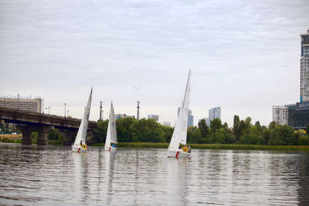 Kyiv, Ukraine - August 12,2016:Sailing school in Kiyv, Ukraine - August 2016 - Young people learning to sail in the harbor at Dniper river Ukraine before International Regatta Hetman Cup (ISAF Grade 2) run in Ukraineのeditorial素材