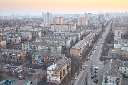 Aerial view of residential district with wonderful flaming sunset sky.View over the city rooftops with sunlight.Moderns buildings at Industrial uptown,residential neighbourhoodの写真素材