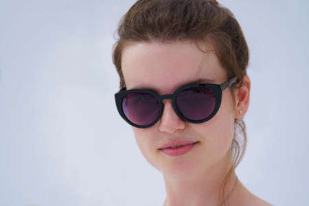 Portrait of a girl in sunglassesの写真素材