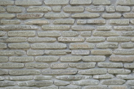 color of modern style design decorative cracked real stone wall surface with cementの写真素材