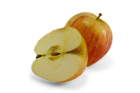 Picture of one whole apple and one half isolated on whiteの写真素材