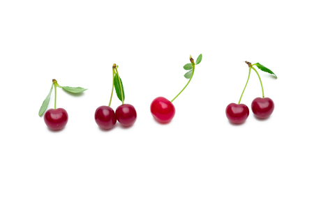 Cherry with leaves isolated on white background.の写真素材
