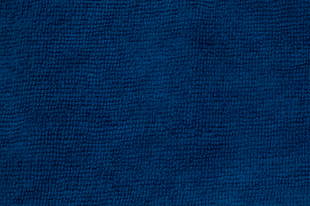 Closeup blue microfiber cloth and blue microfiber texture of microfiber towel for design with copy space for text or image.の写真素材