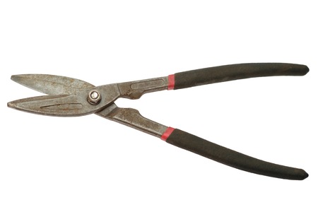 Old shears for cutting sheet metal isolated in the white backgroundの写真素材