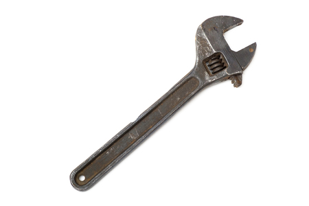 Old adjustable wrench isolated on white backgroundの写真素材