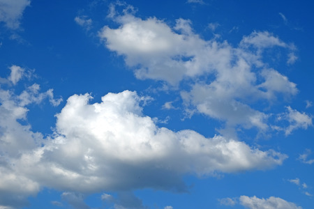 Blue sky background with white clouds. Dayの写真素材