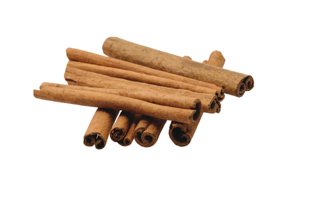 Fragrant cinnamon sticks isolated on white background. Selective focusの写真素材