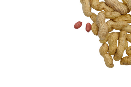 Dried peanuts in closeup isolatd on white background. Top View. Space for text