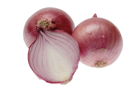 Tow red onions and one half isolated on white backgroundの写真素材