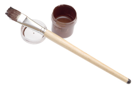 Brown paint and brush isolated on white backgroundの写真素材