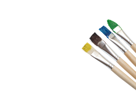 Paint brushes and paint on an background. Empty space for text