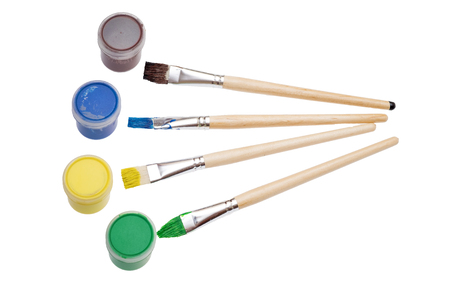 Paint brushes and paint on an background.の写真素材
