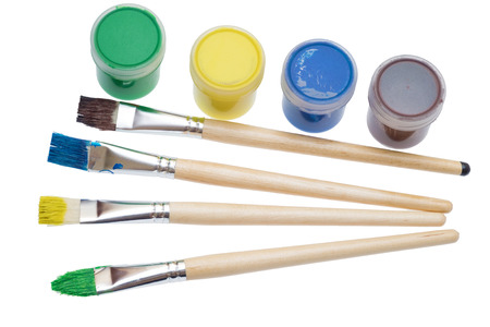 Paint brushes and paint on an background.の写真素材