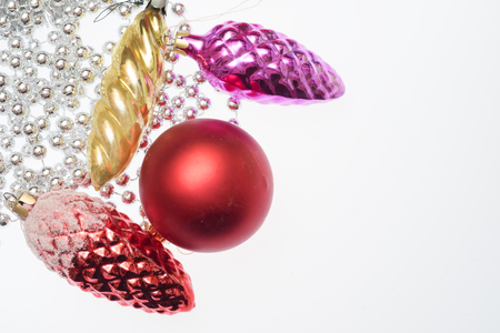 Three christmas toy bump and christmas red ball on white background. Empty space for textの写真素材