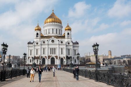 Moscow, Russia - 18 March 2017: .Cathedral of Christ the Saviour is a cathedral in Moscow, People walking at the bridge near the Cathedral of Christ the Saviour in Moscowのeditorial素材