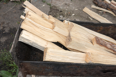 chopped wood in mangal. Ready for fire.の写真素材