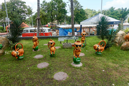 KOH SAMUI, THAILAND - December 12, 2017: CentralFestival Samui. Shopping mall in Ko Samui, Thailand. Figurines of monkeys on the grassのeditorial素材